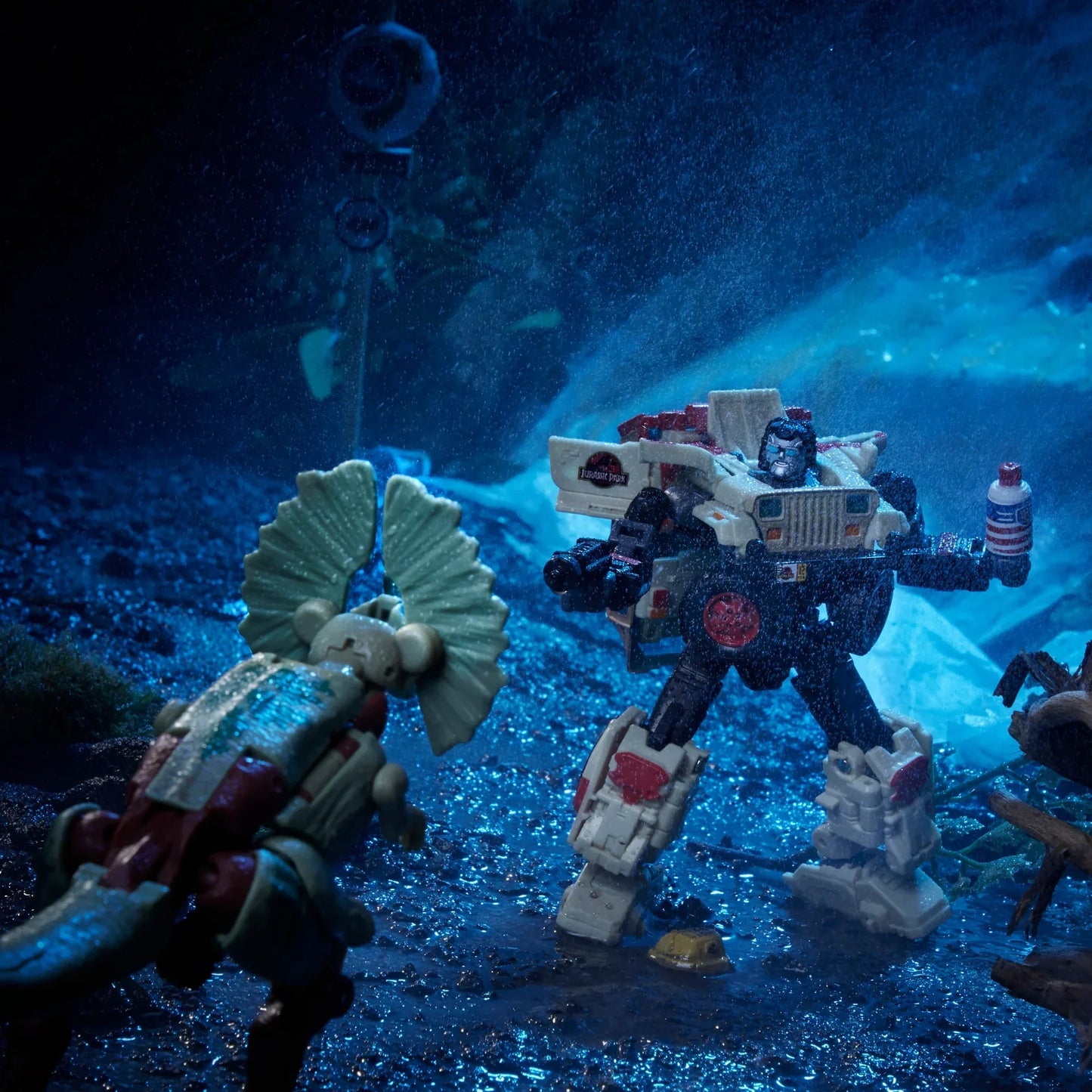 Transformers Collaborative Jurassic Park x Transformers Dilophocon et Autobot JP12